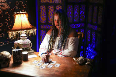 A fortune teller with cards 