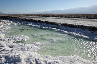 pooled water at death valley national park after hurricane hilary