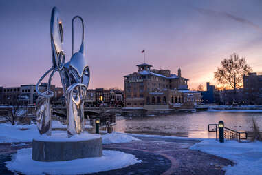 silver sculpture in front of exterior of hotel baker, st charles, illinois